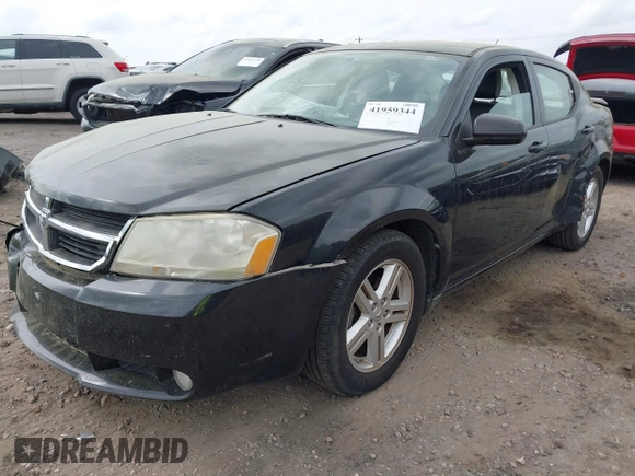 2010 Dodge Avenger R/T with VIN 1B3CC5FB1AN200983, listed as a IAAI auction lot 41959344 with 121,934 mi miles and . Bid and sale history available at DreamBid. Image 2.
