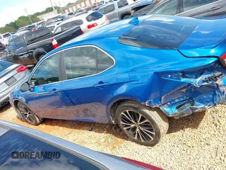 2019 Toyota Camry LE z VIN 4T1B11HK8KU161060, wystawiony jako IAAI lot #42255778 z przebiegiem 104 827 mil mil oraz . Historia ofert i sprzedaży dostępna na DreamBid. Obrazek 14.