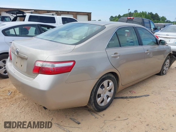 2007 Toyota Camry CE with VIN 4T1BE46K97U569695, listed as a IAAI auction lot 39701395 with 282,284 mi miles and . Bid and sale history available at DreamBid. Image 4.
