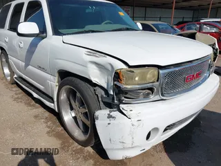 2001 GMC Yukon Denali z VIN 1GKEK63U21J156008, wystawiony jako IAAI lot #42017207 z przebiegiem 238 228 mil mil oraz . Historia ofert i sprzedaży dostępna na DreamBid. Obrazek 1.