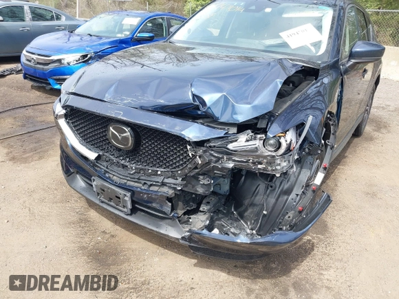 2018 Mazda CX-5 Grand Touring with VIN JM3KFBDM3J0377866, listed as a IAAI auction lot 41947014 with 70,446 mi miles. Bid and sale history available at carsss.com. Image 6.