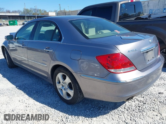 2007 Acura RL Tech Pkg with VIN JH4KB16647C002703, listed as a IAAI auction lot 41882614 with 174,713 mi miles. Bid and sale history available at carsss.com. Image 3.