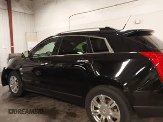 2011 Cadillac SRX Luxury Collection with VIN 3GYFNDEY3BS675672, listed as a IAAI auction lot 41804978 with 148,136 mi miles. Bid and sale history available at carsss.com. Image 14.