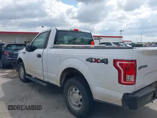 2015 Ford F-150 XL with VIN 1FTMF1E84FKD12758, listed as a IAAI auction lot 41841584 with 59,950 mi miles and . Bid and sale history available at DreamBid. Image 14.