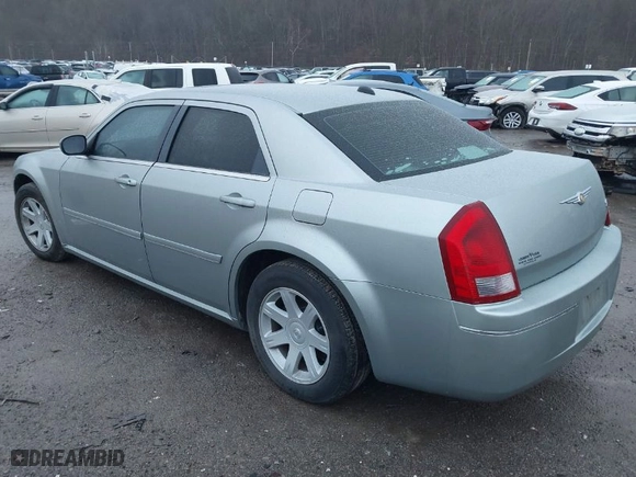 2005 Chrysler 300 with VIN 2C3AA53G65H663507, listed as a IAAI auction lot 41087795 with NaN miles. Bid and sale history available at carsss.com. Image 3.