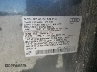 2015 Audi Q7 S line Prestige with VIN WA1DGAFE9FD002055, listed as a Copart auction lot 58073635 with 165,304 mi miles and Salvage title. Bid and sale history available at DreamBid. Image 12.
