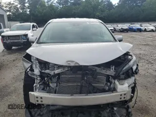 2024 Toyota Sienna LE z VIN 5TDKRKEC7RS188975, wystawiony jako Copart lot #61656985 z przebiegiem 1 017 mil mil oraz Szkoda całkowita • Salvage title. Historia ofert i sprzedaży dostępna na DreamBid. Obrazek 5.