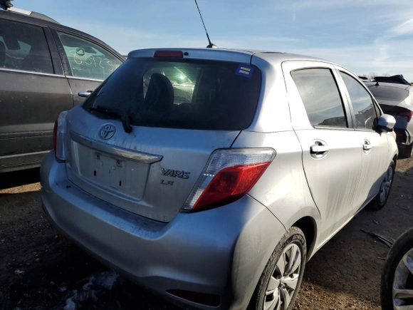 2012 Toyota Yaris L with VIN JTDKTUD30CD527660, listed as a Copart auction lot 42512405 with Not Provided miles and Salvage Title. Bid and sale history available at DreamBid. Image 3.