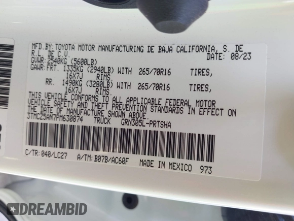 2023 Toyota Tacoma SR with VIN 3TMCZ5AN7PM630874, listed as a IAAI auction lot 40298041 with 8,635 mi miles and . Bid and sale history available at DreamBid. Image 9.