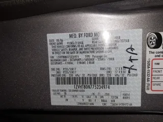 2007 Ford Mustang Deluxe with VIN 1ZVHT80N775234974, listed as a IAAI auction lot 42029377 with 227,856 mi miles. Bid and sale history available at carsss.com. Image 9.
