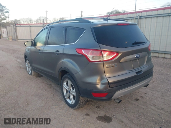 2014 Ford Escape SE with VIN 1FMCU0G91EUB05180, listed as a IAAI auction lot 41758185 with 186,042 mi miles. Bid and sale history available at carsss.com. Image 3.
