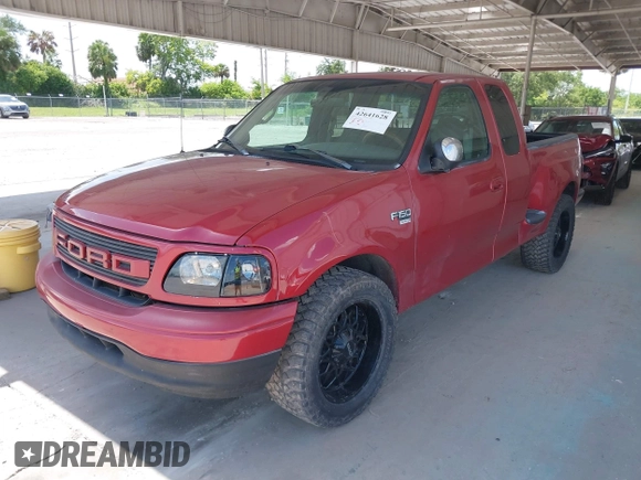 2002 Ford F-150 XL z VIN 1FTRX07L42KB68525, wystawiony jako IAAI lot #42641628 z przebiegiem Nie podano mil oraz . Historia ofert i sprzedaży dostępna na DreamBid. Obrazek 6.