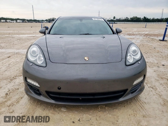 2013 Porsche Panamera S E-Hybrid z VIN WP0AD2A72DL045168, wystawiony jako Copart lot #59136215 z przebiegiem 139 576 mil mil oraz Czysty tytuł • Clean title. Historia ofert i sprzedaży dostępna na DreamBid. Obrazek 5.