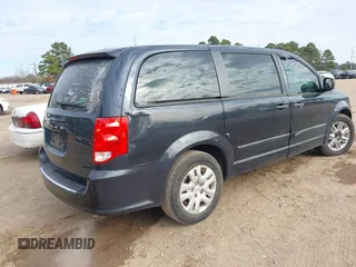 2014 Dodge Grand Caravan American Value with VIN 2C4RDGBG7ER102603, listed as a IAAI auction lot 41278072 with Not Provided miles and . Bid and sale history available at DreamBid. Image 4.