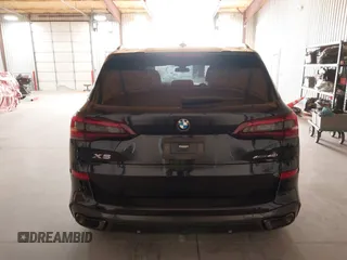 2023 BMW X5 xDrive40i with VIN 5UXCR6C07P9P99054, listed as a IAAI auction lot 42077507 with 18,605 mi miles and . Bid and sale history available at DreamBid. Image 17.