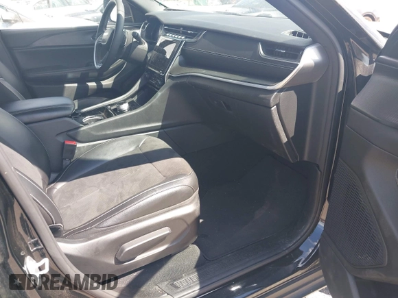 2023 Jeep Grand Cherokee Altitude with VIN 1C4RJJAG4P8817795, listed as a IAAI auction lot 42572709 with 49,468 mi miles and . Bid and sale history available at DreamBid. Image 5.