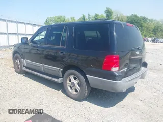 2003 Ford Expedition XLT Value z VIN 1FMPU16W63LA50775, wystawiony jako IAAI lot #42029150 z przebiegiem 296 065 mil mil oraz . Historia ofert i sprzedaży dostępna na DreamBid. Obrazek 3.