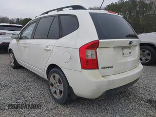 2009 Kia Rondo LX with VIN KNAFG526097252515, listed as a IAAI auction lot 41391949 with 174,583 mi miles. Bid and sale history available at carsss.com. Image 3.