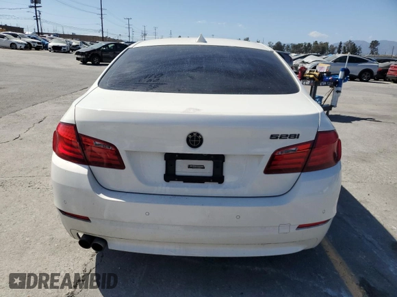 2012 BMW 5 Series 528i z VIN WBAXG5C57CDY30516, wystawiony jako Copart lot #55281415 z przebiegiem 97 908 mil mil oraz Szkoda całkowita • Salvage title. Historia ofert i sprzedaży dostępna na DreamBid. Obrazek 6.