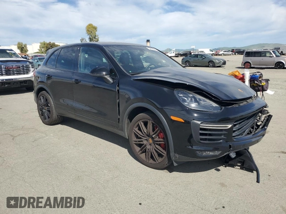 2017 Porsche Cayenne Turbo with VIN WP1AC2A2XHLA92055, listed as a Copart auction lot 52610555 with 82,224 mi miles and Salvage title. Bid and sale history available at DreamBid. Image 4.