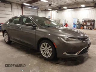 2015 Chrysler 200 Limited with VIN 1C3CCCAB0FN607876, listed as a IAAI auction lot 41882675 with 136,146 mi miles. Bid and sale history available at carsss.com. Image 1.