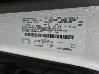 2023 Ford Transit Cargo with VIN 1FTBR1CG2PKB88807, listed as a Copart auction lot 54691055 with 25,269 mi miles and Salvage Title. Bid and sale history available at carsss.com. Image 13.