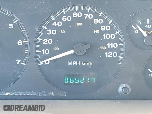 1999 Jeep Grand Cherokee Limited with VIN 1J4GW68N3XC770468, listed as a IAAI auction lot 41793600 with 65,277 mi miles. Bid and sale history available at carsss.com. Image 15.
