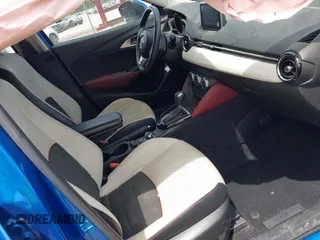 2016 Mazda CX-3 Grand Touring z VIN JM1DKFD78G0134173, wystawiony jako IAAI lot #42179942 z przebiegiem 93 539 mil mil oraz . Historia ofert i sprzedaży dostępna na DreamBid. Obrazek 5.