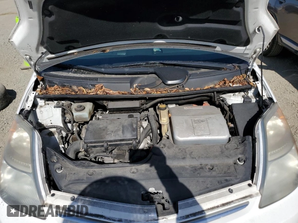 2007 Toyota Prius z VIN JTDKB20U477605335, wystawiony jako Copart lot #58747595 z przebiegiem 129 979 mil mil oraz Szkoda całkowita • Salvage title. Historia ofert i sprzedaży dostępna na DreamBid. Obrazek 11.