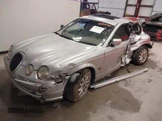 2001 Jaguar S-Type with VIN SAJDA01P81GM09061, listed as a IAAI auction lot 41554986 with 104,105 mi miles and . Bid and sale history available at DreamBid. Image 2.