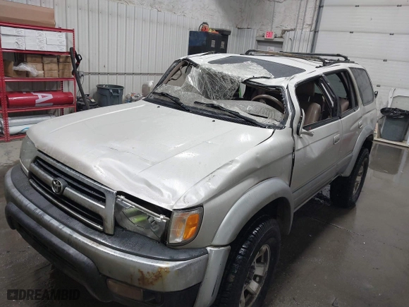 1998 Toyota 4Runner Limited with VIN JT3HN87R0W0189219, listed as a IAAI auction lot 41815288 with 227,784 mi miles. Bid and sale history available at carsss.com. Image 6.