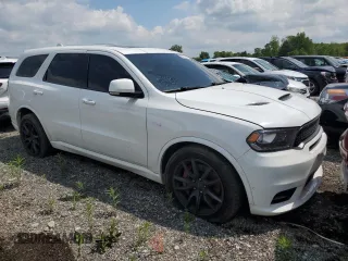 2018 Dodge Durango SRT with VIN 1C4SDJGJ3JC341670, listed as a Copart auction lot 58412575 with 82,936 mi miles and Salvage title. Bid and sale history available at DreamBid. Image 4.