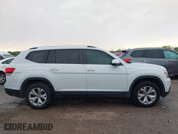 2018 Volkswagen Atlas SE с VIN 1V2DR2CA1JC587959, выставлен на аукционе IAAI как лот 42190292 с пробегом 93 832 миль миль и . История ставок и продаж доступна на DreamBid. Изображение 13.
