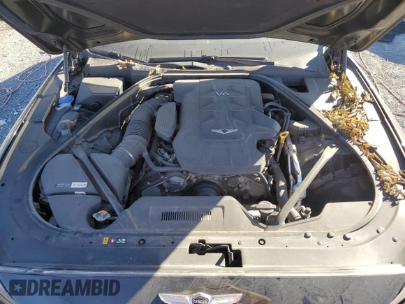 2018 Genesis G80 3.8L with VIN KMHGN4JEXJU250000, listed as a Copart auction lot 79301174 with 74,636 mi miles and Salvage title. Bid and sale history available at DreamBid. Image 11.