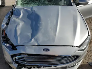 2018 Ford Fusion S z VIN 3FA6P0G77JR181212, wystawiony jako Copart lot #53244345 z przebiegiem 82 008 mil mil oraz Szkoda całkowita • Salvage title. Historia ofert i sprzedaży dostępna na DreamBid. Obrazek 11.