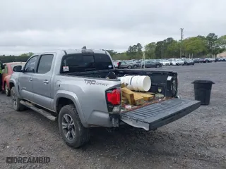 2017 Toyota Tacoma SR5 with VIN 5TFAZ5CN3HX035326, listed as a IAAI auction lot 41940372 with 284,065 mi miles. Bid and sale history available at carsss.com. Image 3.
