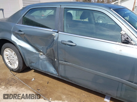 2005 Chrysler 300 with VIN 2C3JA43R45H616682, listed as a IAAI auction lot 41853835 with 158,464 mi miles. Bid and sale history available at carsss.com. Image 6.