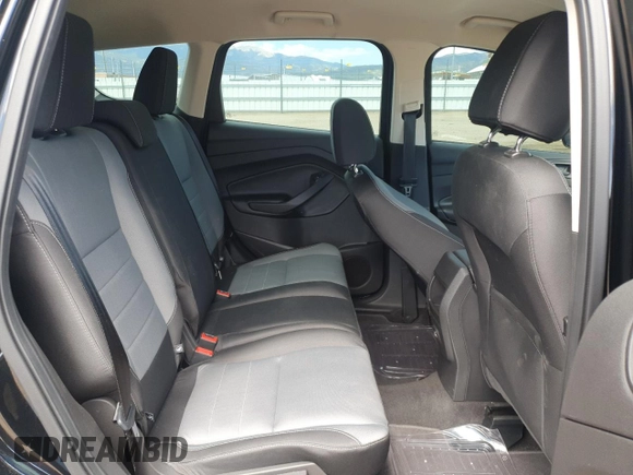 2017 Ford Escape S z VIN 1FMCU0F78HUE91357, wystawiony jako Copart lot #62545785 z przebiegiem 55 002 mil mil oraz Szkoda całkowita • Salvage title. Historia ofert i sprzedaży dostępna na DreamBid. Obrazek 11.