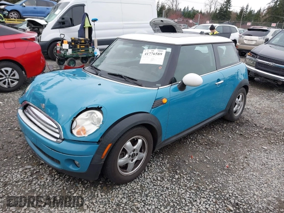 2009 MINI Cooper Hardtop with VIN WMWMF33569TW70413, listed as a IAAI auction lot 41776589 with 85,394 mi miles. Bid and sale history available at carsss.com. Image 2.