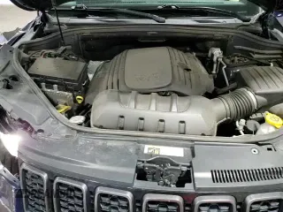 2018 Jeep Grand Cherokee High Altitude with VIN 1C4RJFCT9JC225949, listed as a Copart auction lot 65195915 with 124,472 mi miles and Salvage title. Bid and sale history available at DreamBid. Image 14.