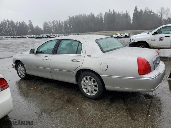 2009 Lincoln Town Car Signature Limited with VIN 2LNHM82V59X623350, listed as a Copart auction lot 46479035 with 123,485 mi miles and Salvage Title. Bid and sale history available at carsss.com. Image 2.