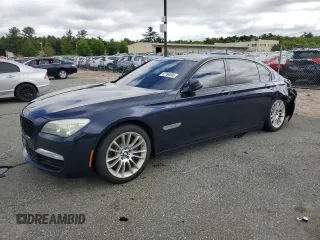2014 BMW 7 Series ALPINA B7 xDrive with VIN WBAYF8C58ED142004, listed as a Copart auction lot 57994895 with 134,841 mi miles and Salvage title. Bid and sale history available at DreamBid. Image 1.