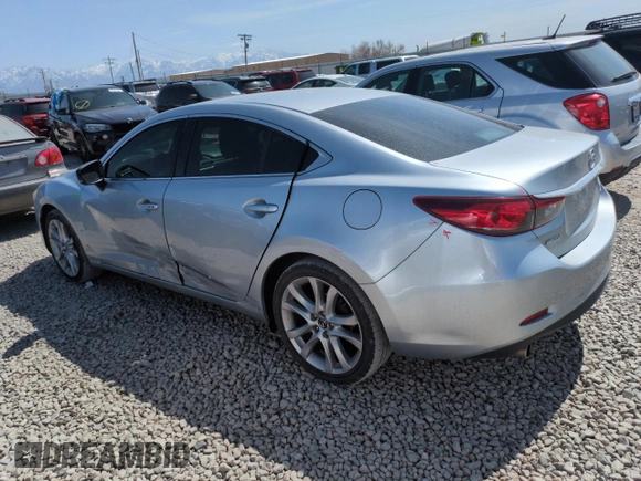 2017 Mazda 6 Touring with VIN JM1GL1V50H1114957, listed as a Copart auction lot 52309915 with 88,761 mi miles and Salvage Title. Bid and sale history available at DreamBid. Image 2.