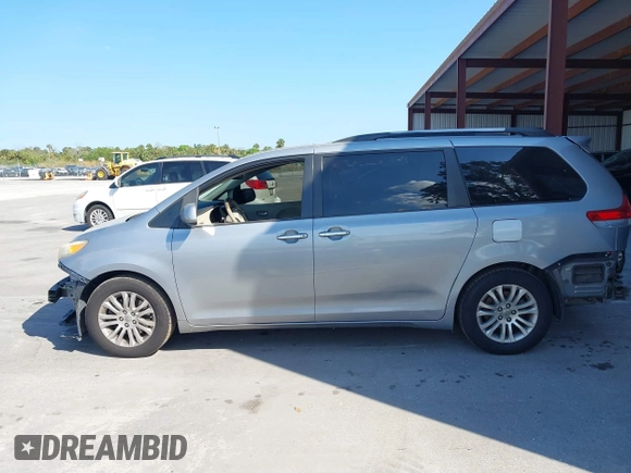 2011 Toyota Sienna XLE AAS with VIN 5TDYK3DC5BS148776, listed as a IAAI auction lot 41525078 with 177,154 mi miles and . Bid and sale history available at DreamBid. Image 15.