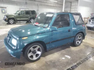 1996 Chevrolet Tracker z VIN 2CNBJ1869T6903842, wystawiony jako Copart lot #87734315 z przebiegiem 120 835 mil mil oraz Szkoda całkowita • Salvage title. Historia ofert i sprzedaży dostępna na DreamBid. Obrazek 1.