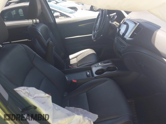 2020 Honda Ridgeline RTL with VIN 5FPYK3F5XLB019296, listed as a IAAI auction lot 42204290 with 48,197 mi miles and . Bid and sale history available at DreamBid. Image 5.