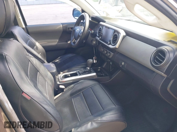 2021 Toyota Tacoma SR with VIN 3TYAX5GNXMT012484, listed as a IAAI auction lot 42429068 with 105,555 mi miles and . Bid and sale history available at DreamBid. Image 5.