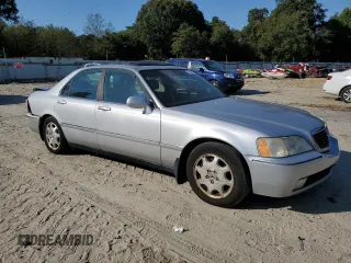 2000 Acura RL w/Navigation System with VIN JH4KA9668YC015201, listed as a Copart auction lot 75046704 with Not Provided miles and Salvage Title. Bid and sale history available at DreamBid. Image 4.