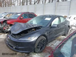 2025 Tesla Model 3 Long Range with VIN 5YJ3E1EB5SF880681, listed as a IAAI auction lot 41429855 with 747 mi miles. Bid and sale history available at carsss.com. Image 2.