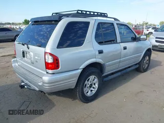 2002 Isuzu Rodeo S with VIN 4S2CK58W024342335, listed as a IAAI auction lot 42595434 with 144,529 mi miles and . Bid and sale history available at DreamBid. Image 4.